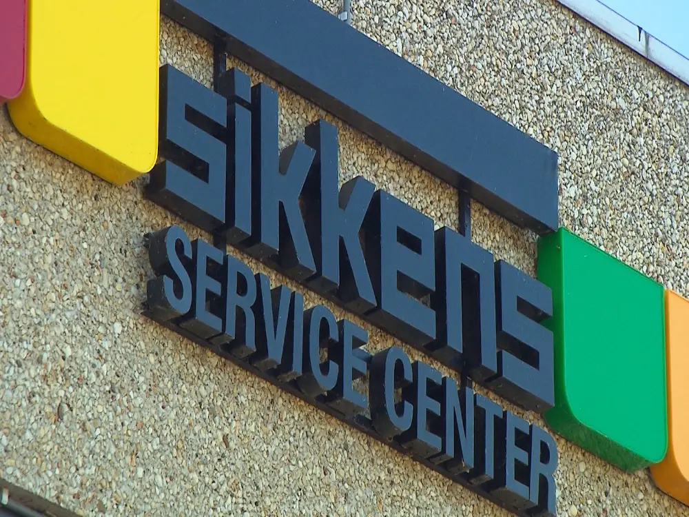 Sikkens logo service center