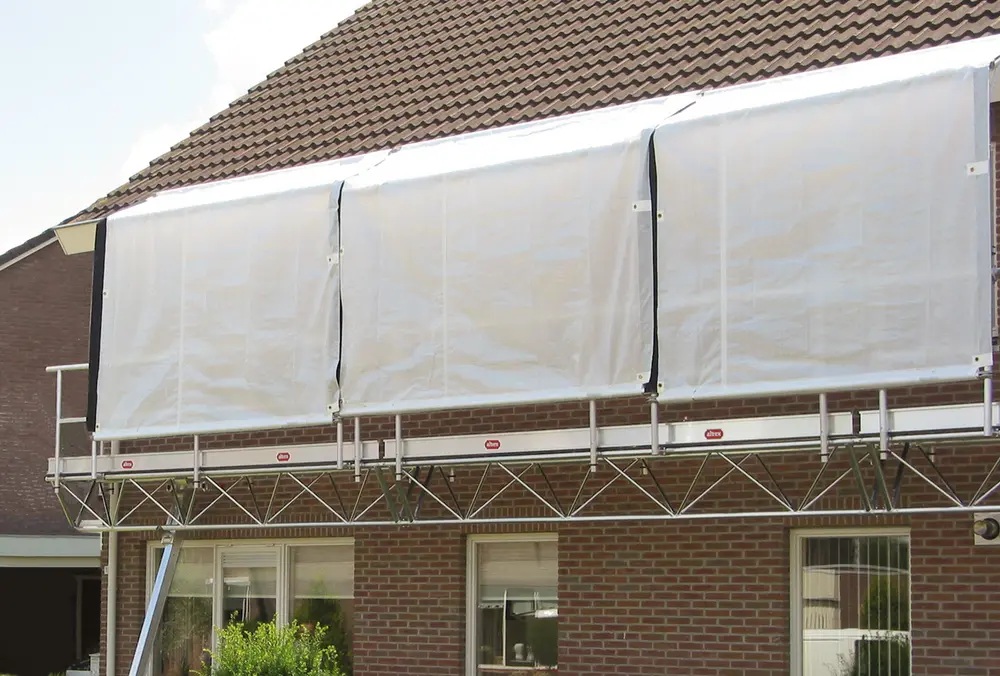 Dankzij het doorwerkscherm kan je makkelijk in weer en regen doorwerken