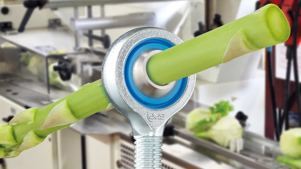 Het smeermiddelvrije en onderhoudsvrije igubal stangkoplager voor toepassingen met hogere belasting in de voedingsindustrie bestaat uit een roestvaststalen behuizing en bolvormige kogel, alsmede een binnenring gemaakt van de hoogwaardige kunststof iglidur A160, die voldoet aan de FDA en EU 10/2011 vereisten. (Bron: igus B.V.)