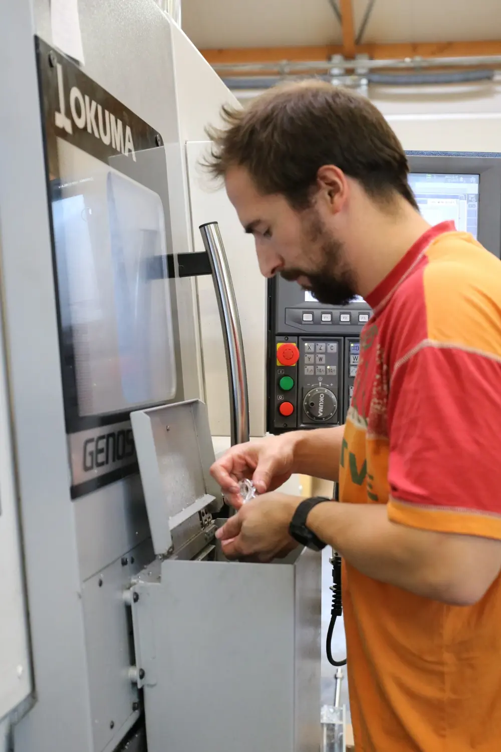 Okuma Genos MYW met afgewerkte onderdelen