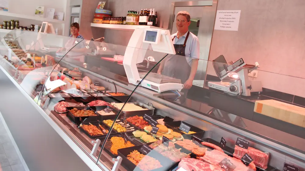 Peter & Maureen Verscheure achter toonbank