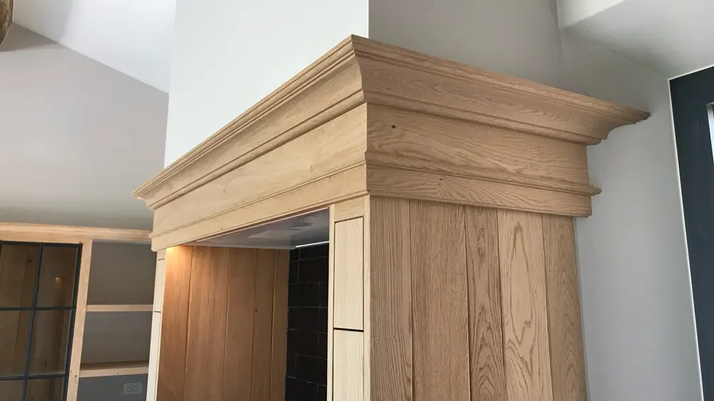 Popelier detail muur hout