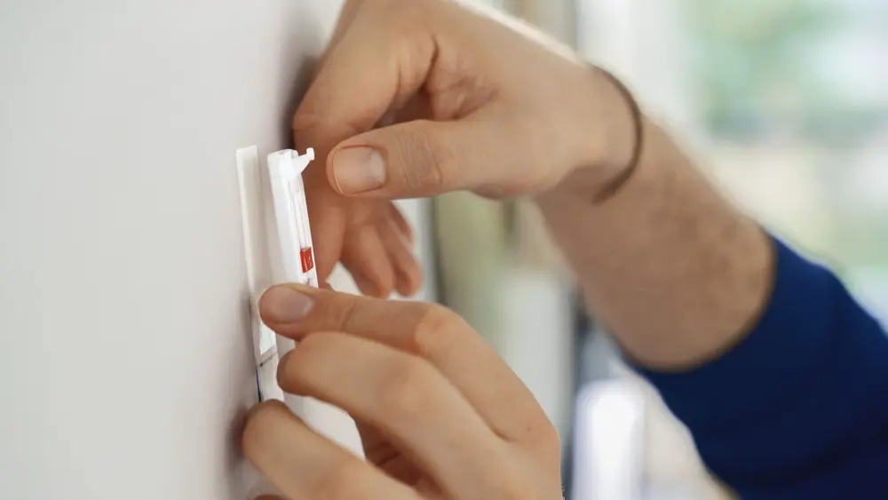 Mounting adhesive nail