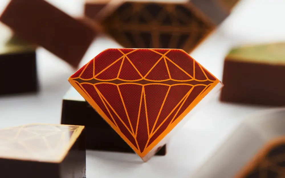 De pralinevorm geeft al een tip over de locatie van DelReY