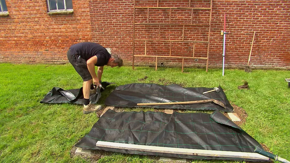 gronddoek over de fundering