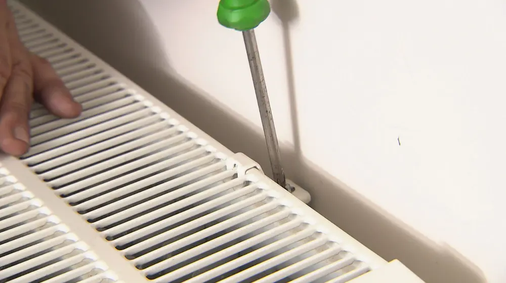 radiator terugplaatsen