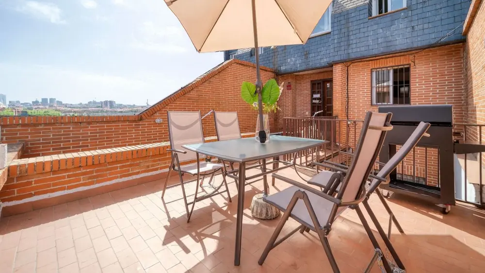 dakterras met barbecue